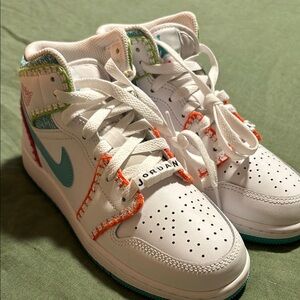 Jordan White High-Top Sneakers with Orange Accents